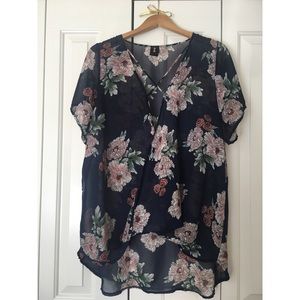 Sheer floral top with crisscross detail